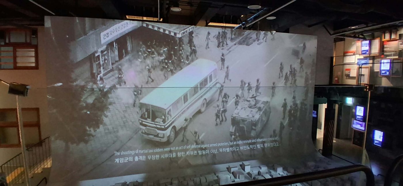Projection: martial law troops in Gwangju