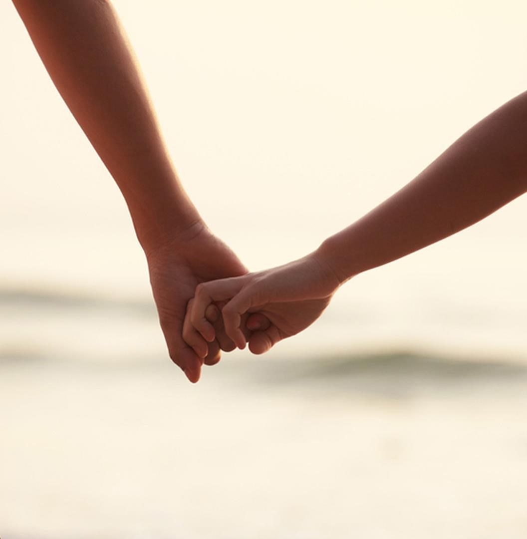 Two hands holding